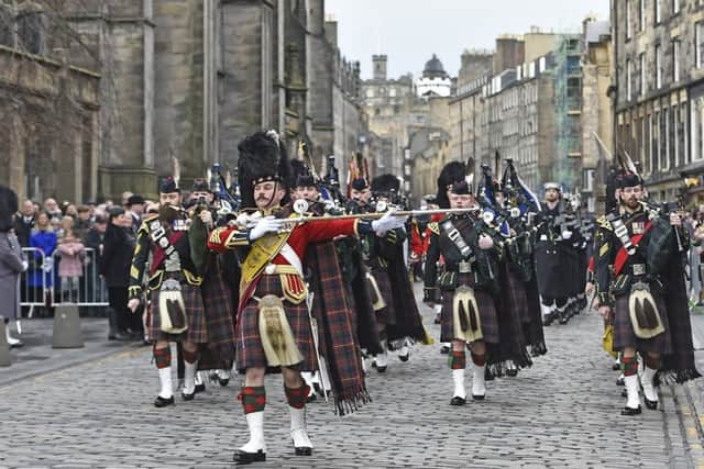 Members of the Armed Forces community held a ceremony at the Stone of Remembrance. Picture: TSPL