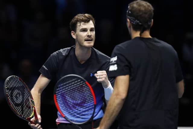 Jamie Murray celebrates winning a point with partner Bruno Soares on the way to victory at the O2 Arena in London. Picture: Getty Images