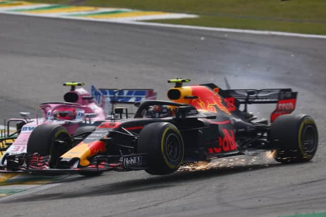 Max Verstappen (33) is crashed into by Esteban Ocon (31) in Brazil. Picture: Lars Baron/Getty Images