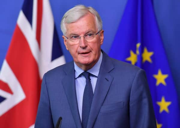 EU Chief Brexit Negotiator Michel Barnier speaks during a joint press conference with Britain's Brexit Secretary at the European Commission in Brussels