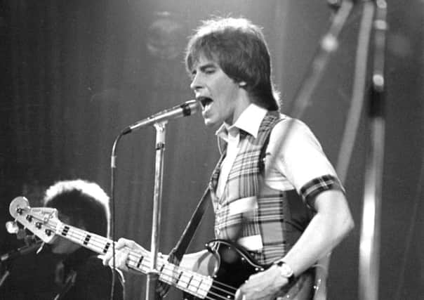 Alan Longmuir of the Bay City Rollers on stage