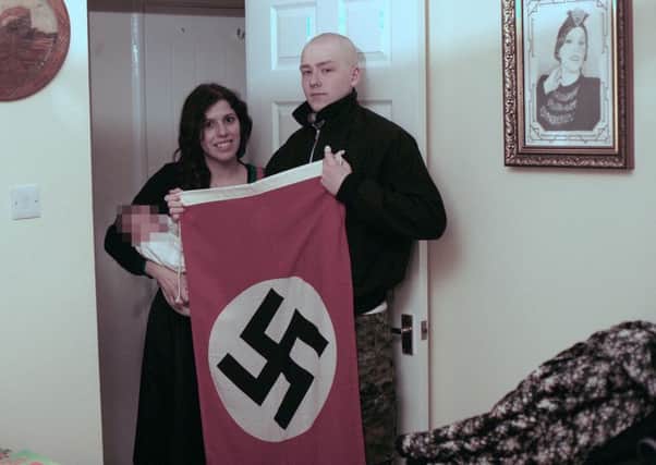 Photo issued by West Midlands Police of Adam Thomas and his partner Claudia Patatas with their new born baby. Mr Thomas, 22, and Ms Patatas, 38,  have been found guilty of being members of the extreme right-wing organisation National Action, which was banned in 2016.