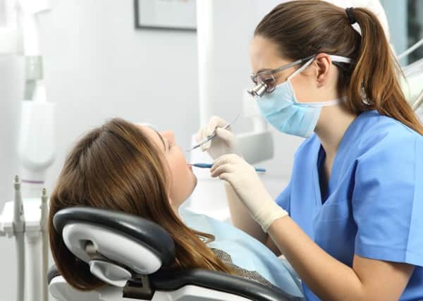 A move to restrict dental check-ups to once every two years could put lives at risk, according to dentists.