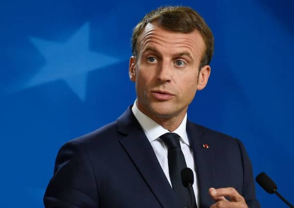 France's President Emmanuel Macron (Photo by JOHN THYS / AFP)JOHN THYS/AFP/Getty Images
