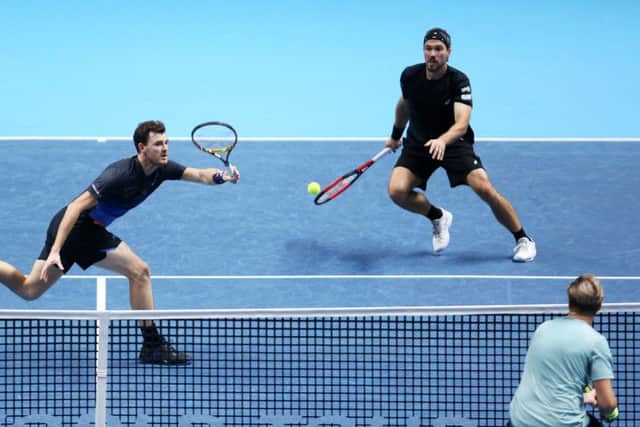 Jamie Murray returns the ball during the win over Henri Kontinen and John Peers at the ATP Finals. Picture: Alex Pantling/Getty Images