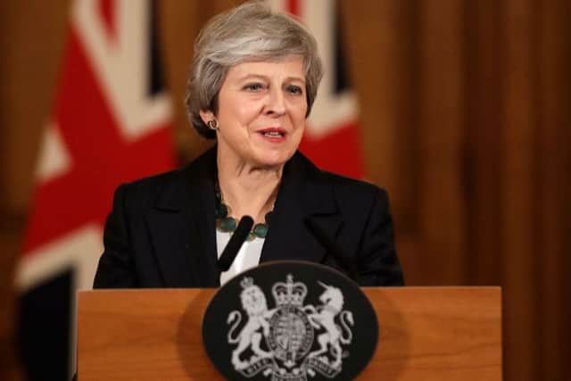 British Prime Minister Theresa May battled against a rebellion over her draft Brexit deal on Thursday, as ministers resigned and members of her own party plotted to oust her. (Photo by Matt Dunham / POOL / AFP)MATT DUNHAM/AFP/Getty Images