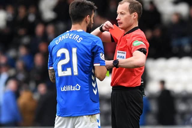 Rangers' Daniel Candeias is shown a red card by Willie Collum. Picture: SNS/Rob Casey