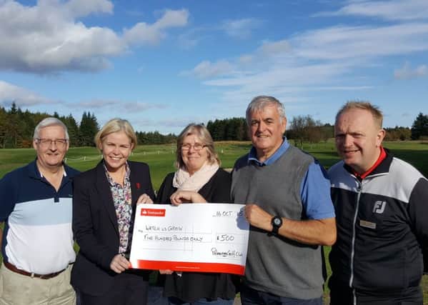 Watch US Grow general manager Ann McCulloch (centre) receiving a cheque flanked by (l-r) Watch US Grow chairman Councillor Tom Fisher, NL Leisure managing director Emma Walker, Palacerigg Gold Club captain Eddie Duffy and GolfNL's partnership and income manager John Kelly