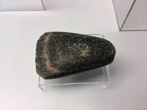 The gneiss axe found at the Ness of Brodgar site this summer. PIC: Contributed.