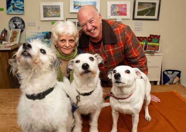 Susan Maxwell, organiser of The Loch Lomond Craft Centre, with Iain Scott and dogs Tinker, Taggie and Alba. Picture: Ian Jacobs