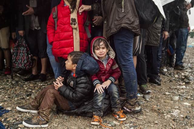 Syrian refugees at the UNHCR Registration centre in Gegeliya , near the Serbian border with Macedonia.