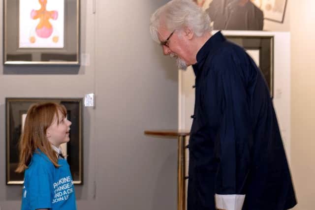 Seven-year-old Abby McConnell meeting her hero Sir Billy Connolly, as a reward for her charity fundraising efforts. Picture: Rosaleen Bonnar Photoworks/PA Wire
.
