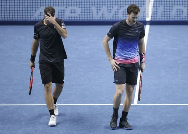 Jamie Murray and Bruno Soares look dejected in their ATP World Tour Finals doubles tennis match. Pic: AP/Tim Ireland