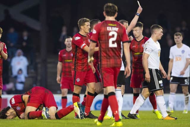 Ayr United's Craig Moore is shown a red card following an altercation with Morton's Gregor Buchanan. Pic: SNS/Alan Harvey