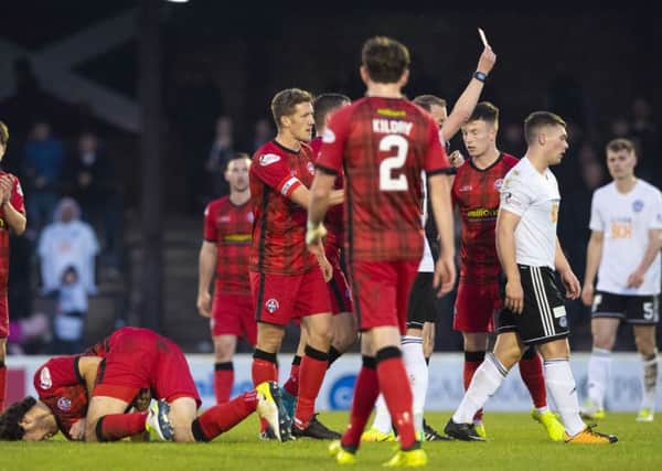 Ayr United's Craig Moore is shown a red card following an altercation with Morton's Gregor Buchanan. Pic: SNS/Alan Harvey