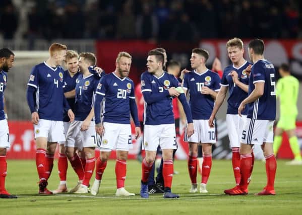 Scotland players celebrate after the final whistle. Pic: Adam Davy/PA Wire.