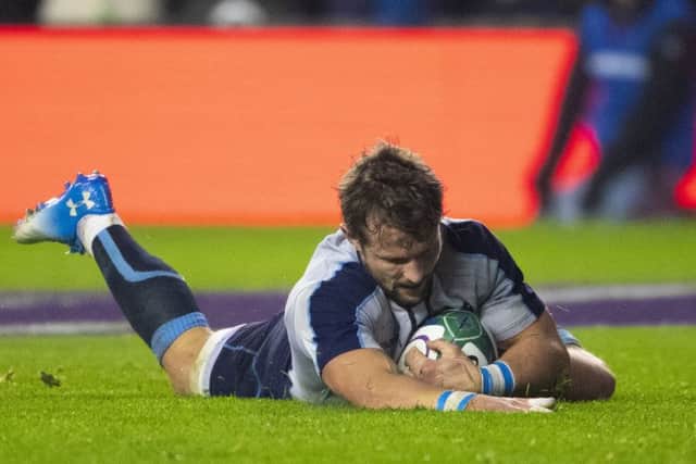 Scotland's Peter Horne scores the home side's first try. Picture: SNS/SRU