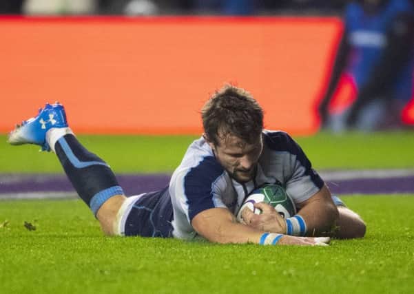 Scotland's Peter Horne scores the home side's first try. Picture: SNS/SRU