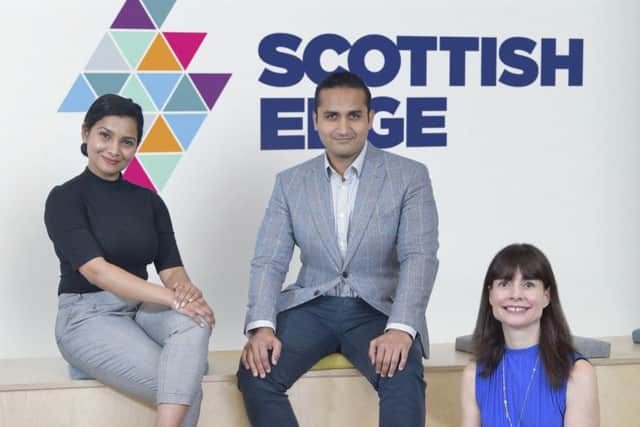 L to R: Bounce Back Drinks Vandana Pillai and Dhruv Trivedi with Evelyn McDonald, chief executive of Scottish Edge. Picture: Sandy Young