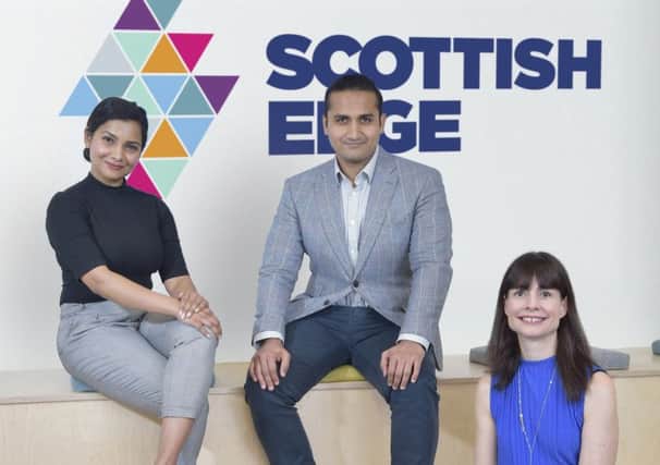 L to R: Bounce Back Drinks Vandana Pillai and Dhruv Trivedi with Evelyn McDonald, chief executive of Scottish Edge. Picture: Sandy Young