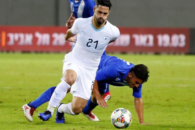 Israel's midfielder Beram Kayal vies against Guatemala defender Wilson Pineda during their friendly encounter on Thursday. Picture: AFP/Getty