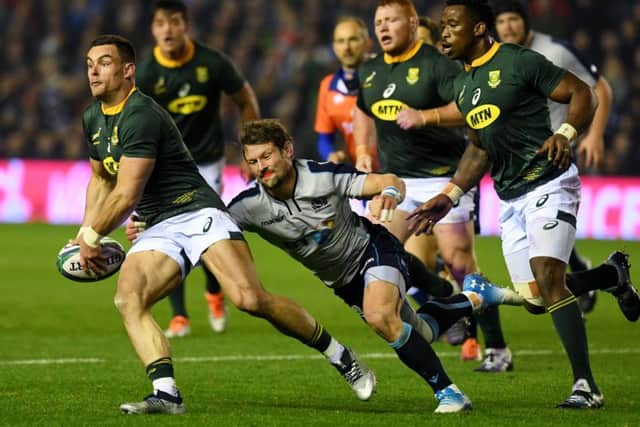 South Africa's Malcolm Max and Scotland's Peter Horne battle for possession. Picture: SNS Group