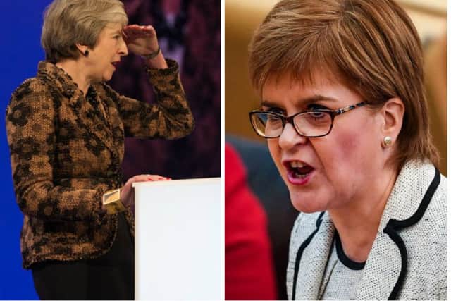 Nicola Sturgeon (right) called on a 'coalition' of MPs to defeat Theresa May's Brexit deal. Picture: PA/AFP