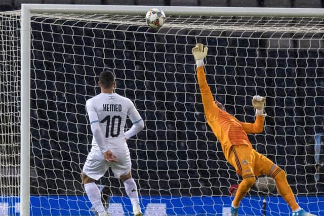 Allan McGregor produces a point-blank save to preserve Scotland's victory. Picture: SNS