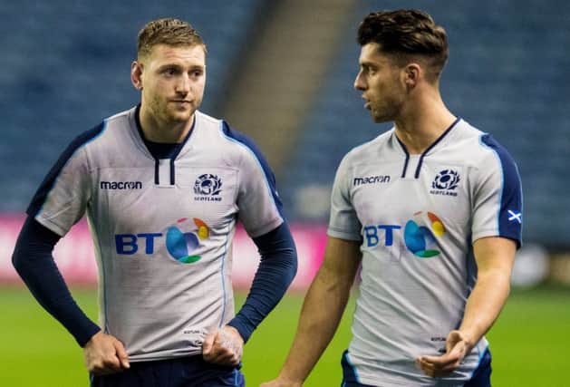 Finn Russell and Adam Hastings has both been included in the starting XV. Picture: SNS