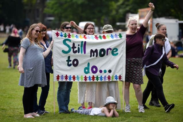 Supporters of Processions 2018 mark 100 years since women 
won the right to vote in the UK. Picture: Jeff J Mitchell/Getty