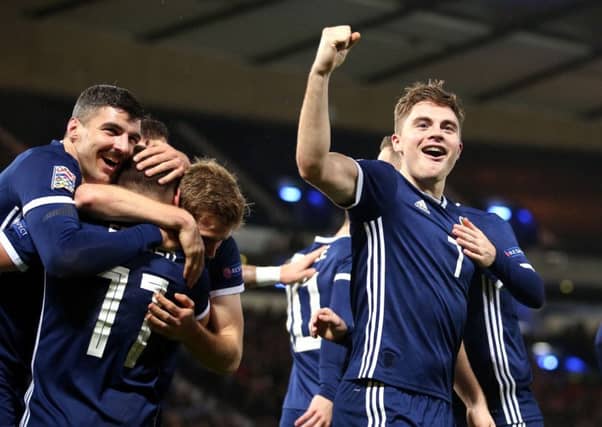 Scotland's James Forrest celebrates the third goal of his hat-trick against Israel. Picture: Jane Barlow/PA Wire