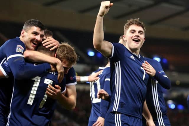 Scotland's James Forrest celebrates the third goal of his hat-trick against Israel. Picture: Jane Barlow/PA Wire