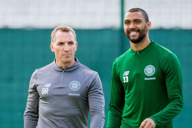 Brendan Rodgers, left, with Marvin Compper during a training session at Lennoxtown. Picture: SNS Group