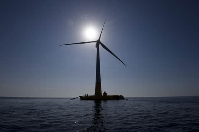 The first floating offshore wind turbine "floatgen" is pictured off La Turballe, western France on September 28 2018. (Photo by SEBASTIEN SALOM GOMIS / AFP)