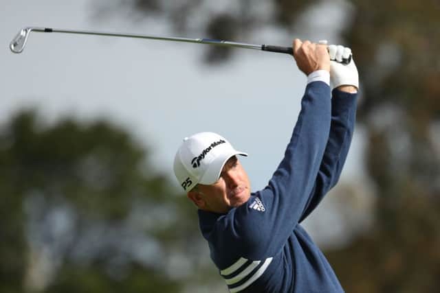 Martin Laird hits a shot at the opening hole in the ISPS Handa World Cup of Golf at The Metropolitan Club in Melbourne. Picture: Getty Images