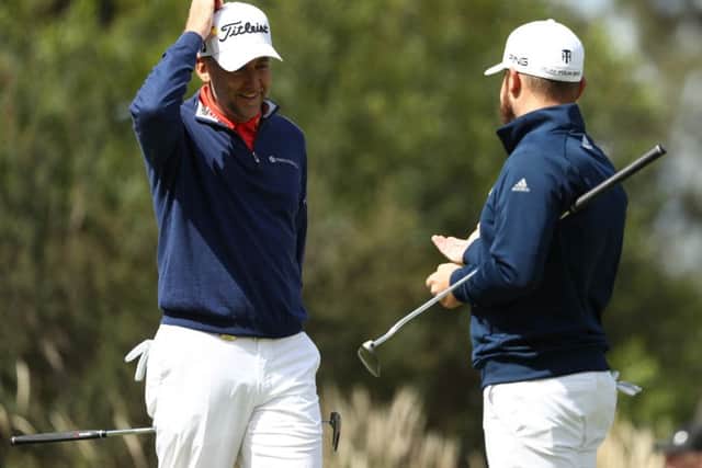 English duo Ian Poulter and Tyrrell Hatton fired a 10-under-par 62 to share the lead with Australia and Korea. Picture: Getty Images