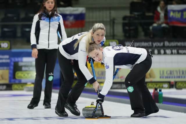 Skip Eve Muirhead watches as Lauren Gray, left, and Jennifer Dodds sweep one of her stones. Picture: Alina Pavlyuchik/WCF