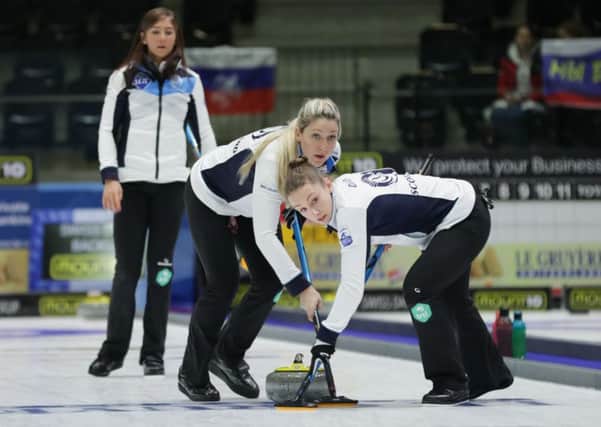 Skip Eve Muirhead watches as Lauren Gray, left, and Jennifer Dodds sweep one of her stones. Picture: Alina Pavlyuchik/WCF