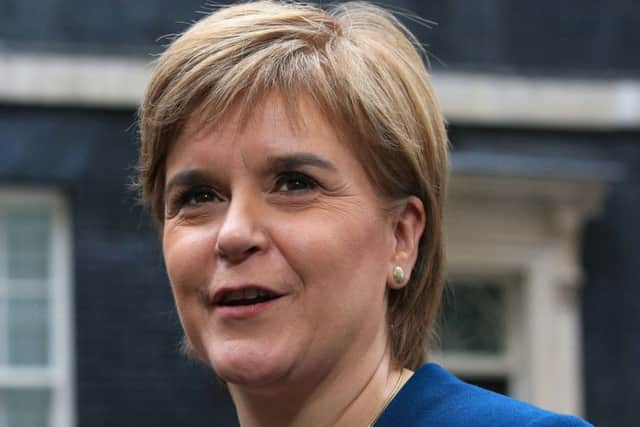 First Minister of Scotland Nicola Sturgeon speaks to the media in Downing Street in London after a Joint Ministerial Council meeting. Jonathan Brady/PA Wire