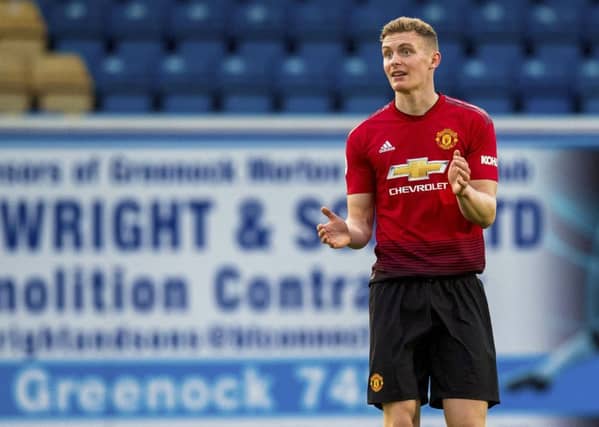Ethan Hamilton in action for Manchester United during a friendly with Morton. Picture: SNS