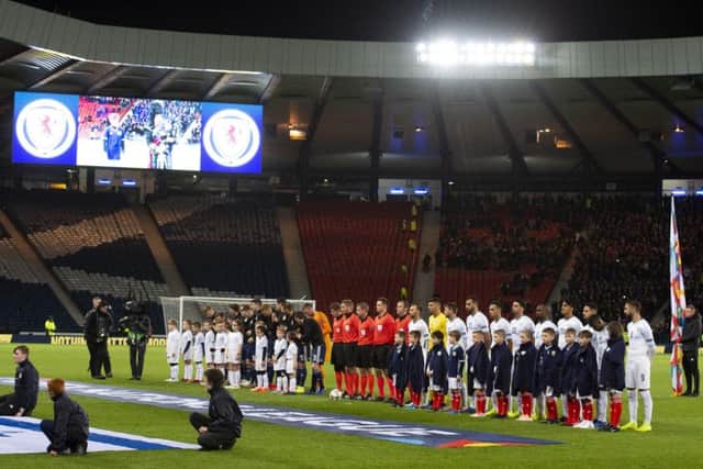 Scotland and Israel players line up ahead of kick off. Pic: SNS