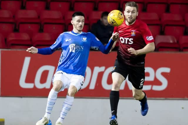 Kilmarnock's Greg Stewart competes with Scott Tanser. Pic: SNS/Kenny Smith