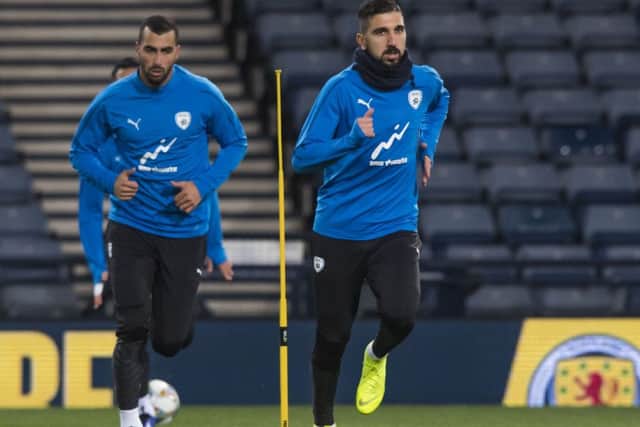 Israel and Salzburg's Moanes Dabour (right). Pic: SNS
