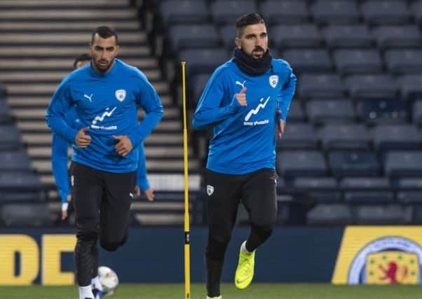 Israel and Salzburg's Moanes Dabour (right). Pic: SNS