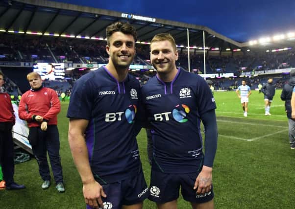Adam Hastings (left) and Finn Russell celebrate at full time. Pic: SNS/SRU/Gary Hutchison