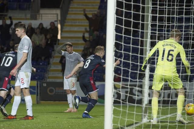 Jamie Lindsay runs off to celebrate after scoring for County. Pic: SNS/Garry Williamson
