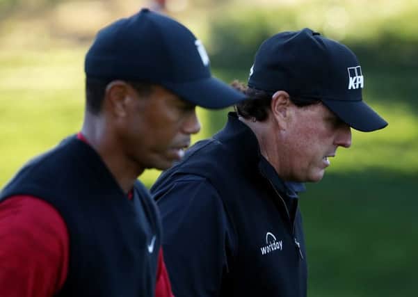 Tiger Woods and Phil Mickelson walk during The Match. Pic: Christian Petersen/Getty Images