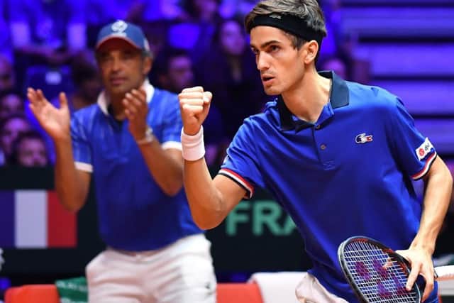 France's Pierre-Hugues Herbert celebrates. Pic: Philippe Huguen//AFP/Getty