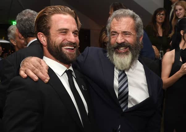 Milo Gibson with dad Mel. Picture: Getty