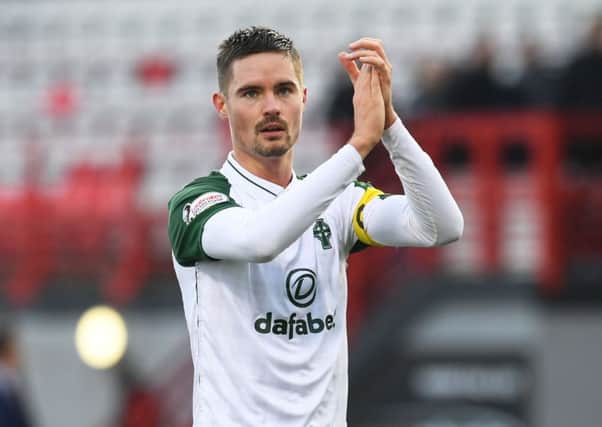 Mikael Lustig acknowledges the Celtic fans after the match at Hamilton. Picture: Craig Foy